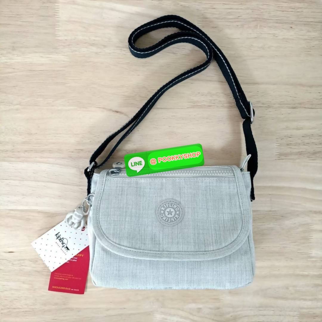 KIPLING SABIAN CROSSBODY MINI BAG กระเป๋าสะพายข้าง วัสดุ Nylon & Polyester 100% ขนาดเล็กกำลังน่ารัก เปิด-ปิดด้วยฝาปิดกระดุมแม่เหล็กและซิปแบรนด์ ด้านในมีแท็กแบรนด์