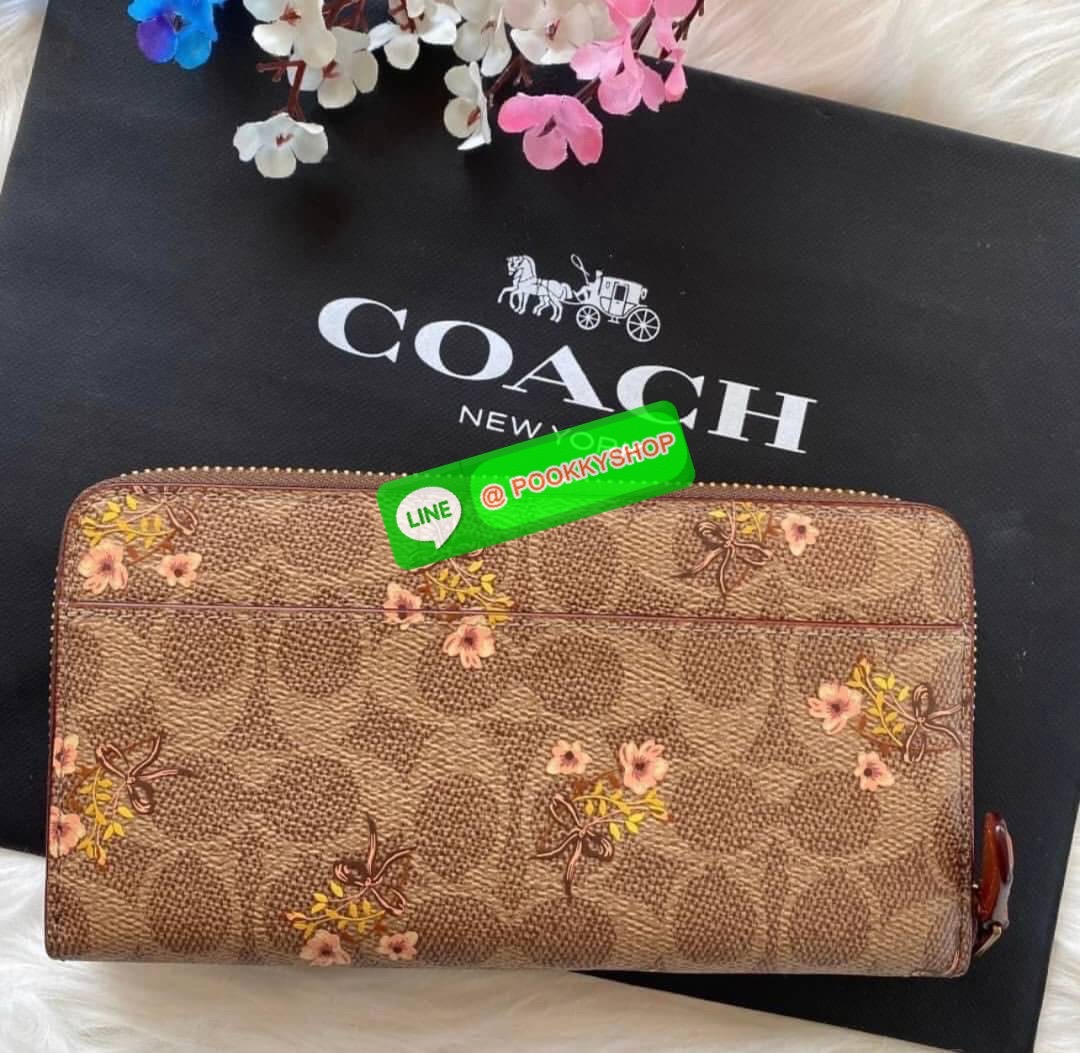 Coach Accordion Zip Wallet In Signature Canvas With Floral Bow Print