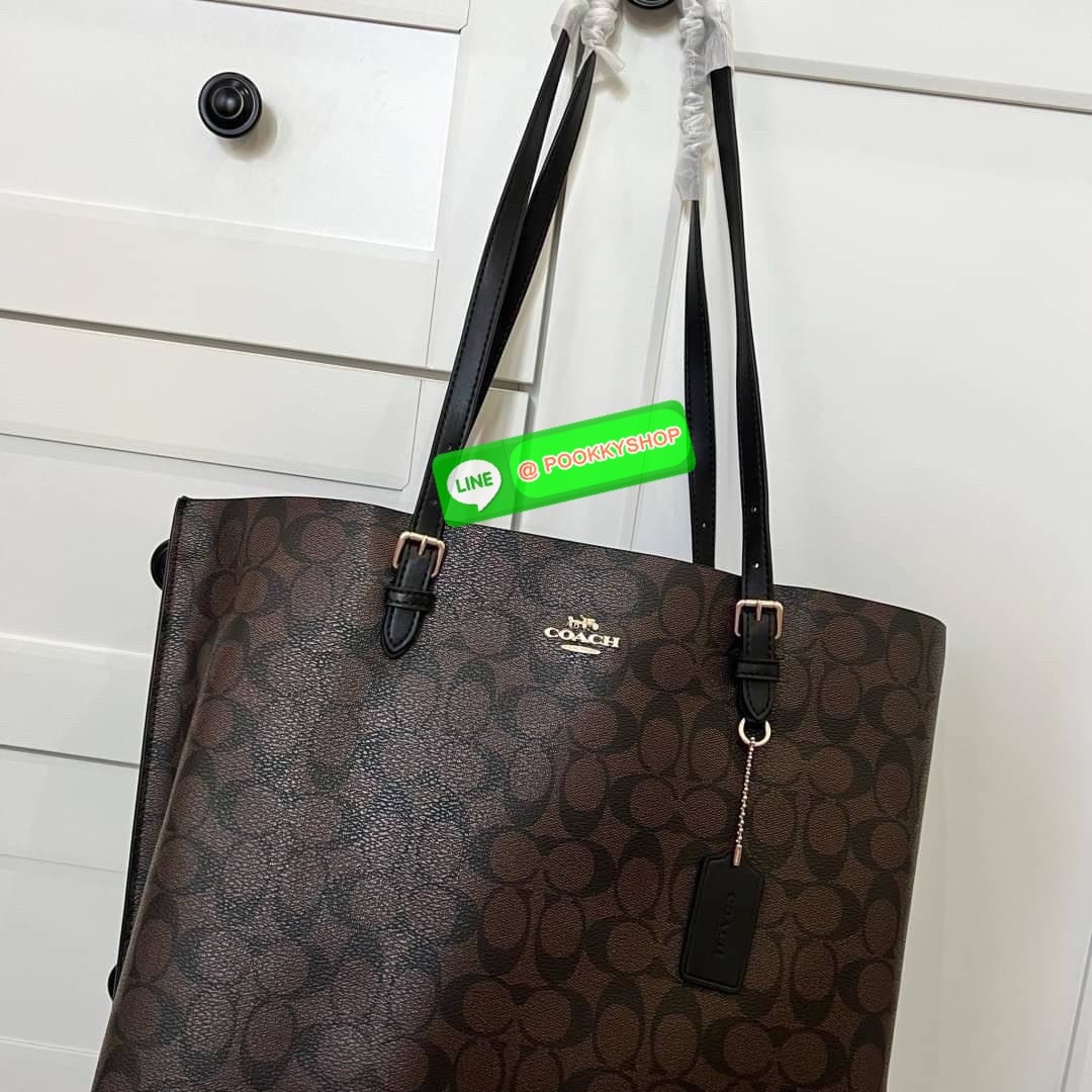 Coach MOLLIE TOTE IN SIGNATURE CANVAS (COACH 1665) กระเป๋าหนังใบเคลือบซิกเนเจอร์และหนังเรียบ ภายในกระเป๋ามัลติฟังก์ชั่น ปิดด้วยซิป ซับในผ้า หูหิ้วพร้อมหูหิ้ว 10 1/4" ช่องเปิดด้านข้าง