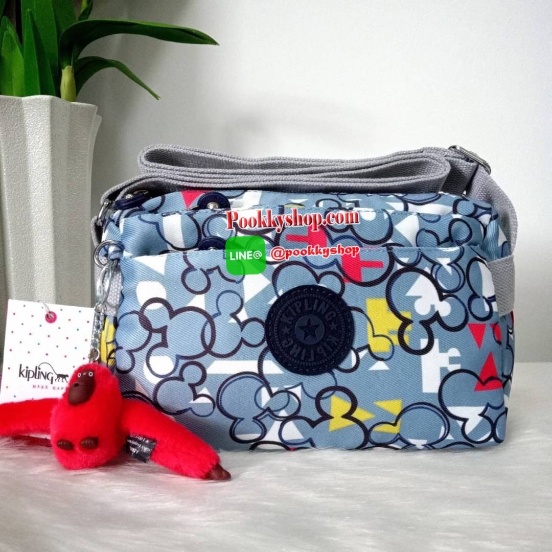KIPLING Mini Crossbodybag กระเป๋าสะพายข้างขนาดกะทัดรัด ผลิตจากวัสดุ Nylon+ Polyester100% มีช่องใช้งานแยกย่อยมากถึง 4 ช่อง -ด้านหน้ามีช่องซิป 2 ช่อง -ช่องหลักโล่ง กว้าง จุของใช้ได้เยอะ -ด้านหลังมีช่องซิปอีก 1 ช่อง มาพร้อมพวงกุญเเจลิง สายสะพายยาวสามารถปรับไ