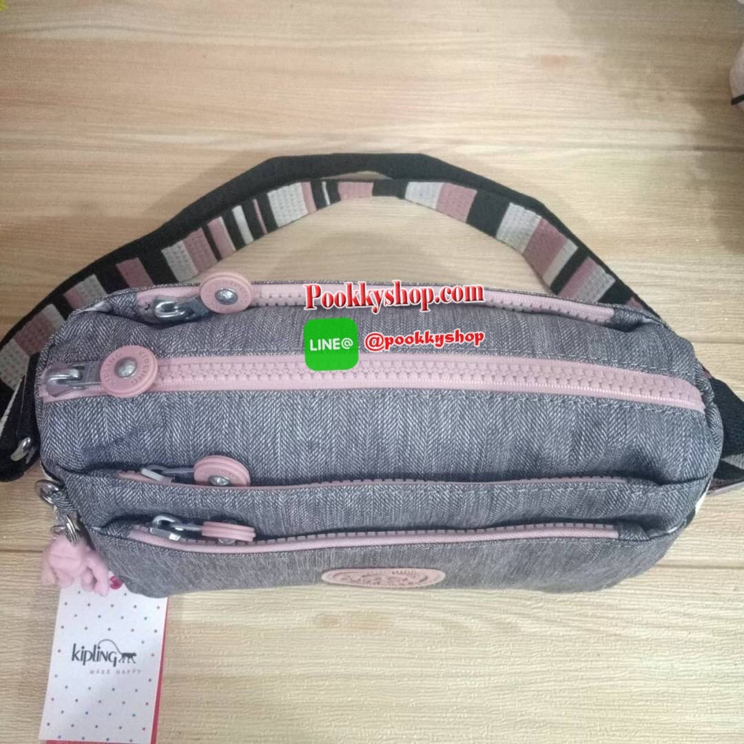 KIPLING Mini Crossbodybag กระเป๋าสะพายข้างขนาดกะทัดรัด ผลิตจากวัสดุ Nylon+ Polyester100% มีช่องใช้งานแยกย่อยมากถึง 4 ช่อง -ด้านหน้ามีช่องซิป 2 ช่อง -ช่องหลักโล่ง กว้าง จุของใช้ได้เยอะ -ด้านหลังมีช่องซิปอีก 1 ช่อง มาพร้อมพวงกุญเเจลิง สายสะพายยาวสามารถปรับไ