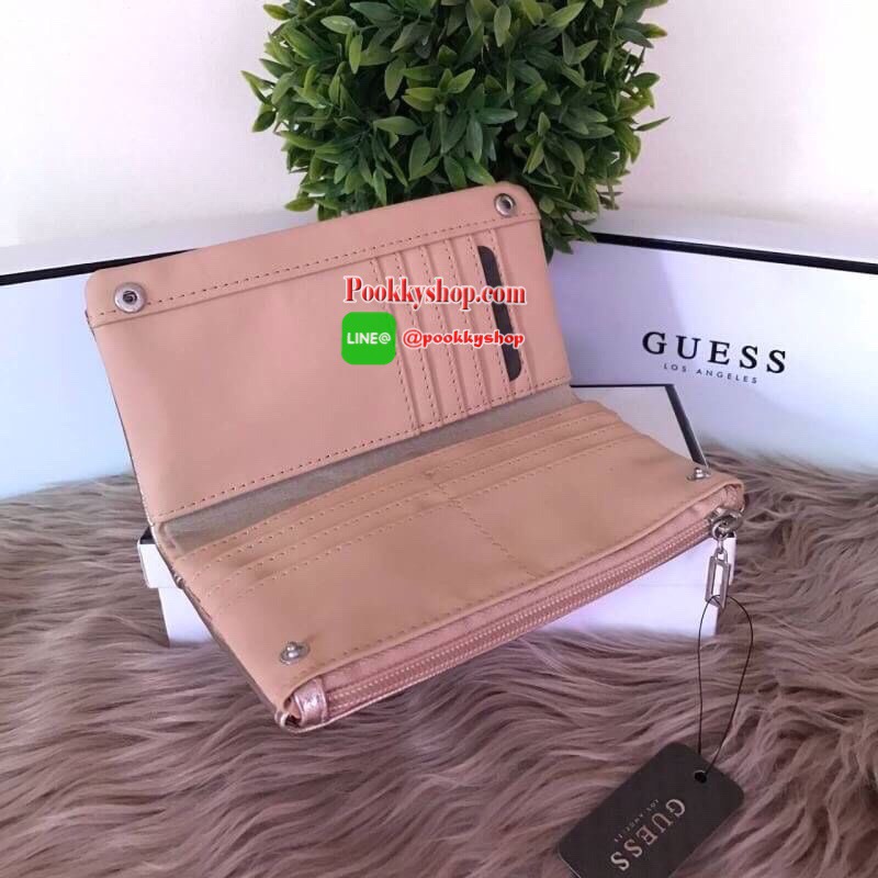 G by Guess leather wallet กระเป๋าสตางค์ใบยาว รุ่นสองด้านเปิด ปิดด้วยกระดุม และซิป ด้านหน้าแต่งโลโก้แบรนด์โลหะสีเงินประดับเพ็ชรหรูหราน่าใช้ ภายในมีช่องใส่ธนบัตร ใส่บัตร ปิดเปิดใช้งานสะดวก รุ่นแนะนำค่ะ หนังดีมากค่ะ ทนทานคุ้มค่าแน่นอน