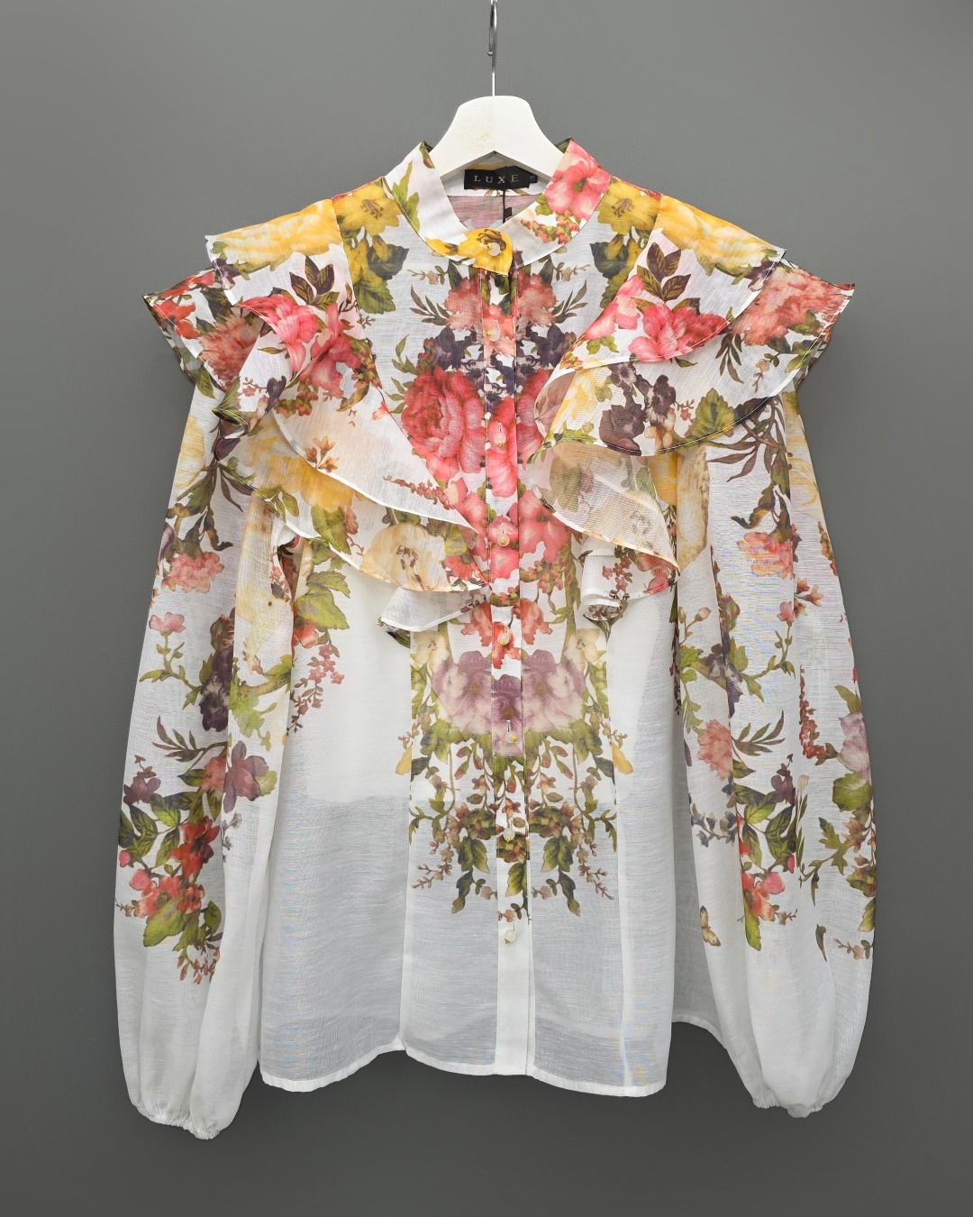 ชุดเซทแฟชั่น เซ็ตเสื้อคอกลมแขนยาว+กระโปรงยาว แต่งระบายตัวเสื้อหน้าและหลัง