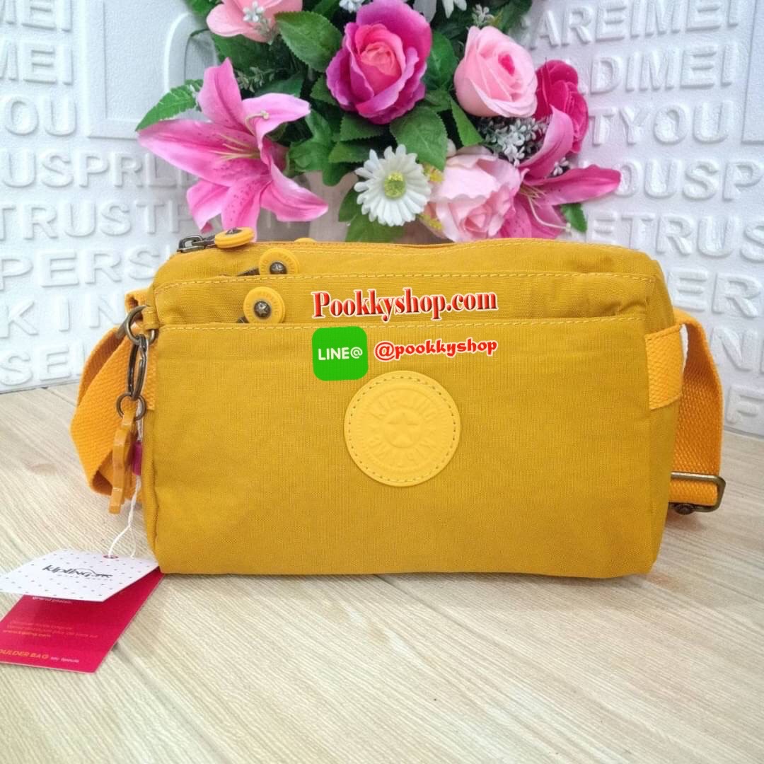 KIPLING Mini Crossbodybag กระเป๋าสะพายข้างขนาดกะทัดรัด ผลิตจากวัสดุ Nylon+ Polyester100% มีช่องใช้งานแยกย่อยมากถึง 4 ช่อง -ด้านหน้ามีช่องซิป 2 ช่อง -ช่องหลักโล่ง กว้าง จุของใช้ได้เยอะ -ด้านหลังมีช่องซิปอีก 1 ช่อง มาพร้อมพวงกุญเเจลิง สายสะพายยาวสามารถปรับไ