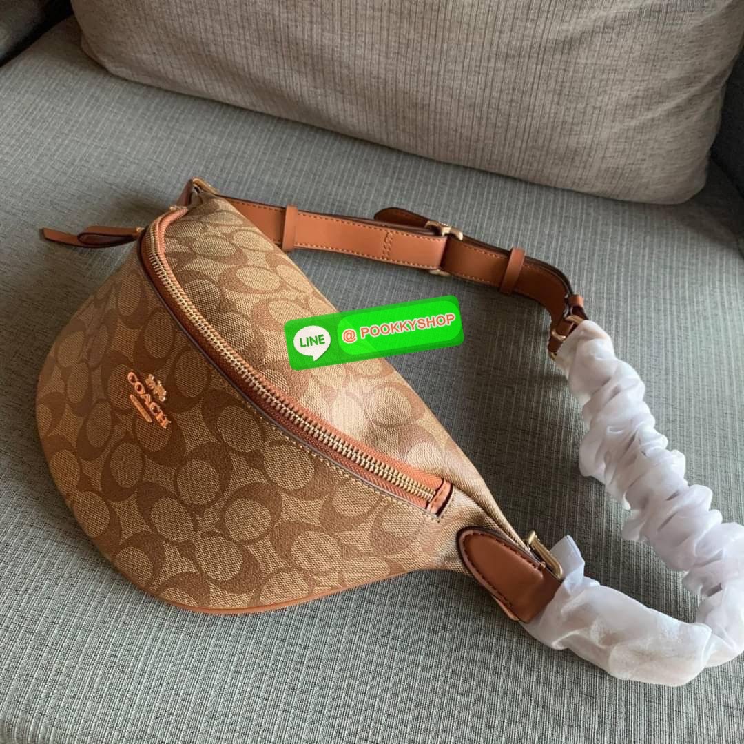 COACH F48740 BELT BAG IN SIGNATURE CANVAS กระเป๋าคาดอกทรง Unisex ทรงโดมรุ่นยอดฮิตไม่มีตกเทรน สวยเท่ทุกสี วัสดุหนังแคนวาสเคลือบคุณภาพดีตัดหนังแท้ ทนทาน ใช้งานง่าย ภายในเป็นช่องโล่ง ใส่ของได้เยอะ หยิบจับได้สะดวก ใช้ได้ทั้งชายและหญิง ใบจริงสวยไม่ผิดหวังคะ
