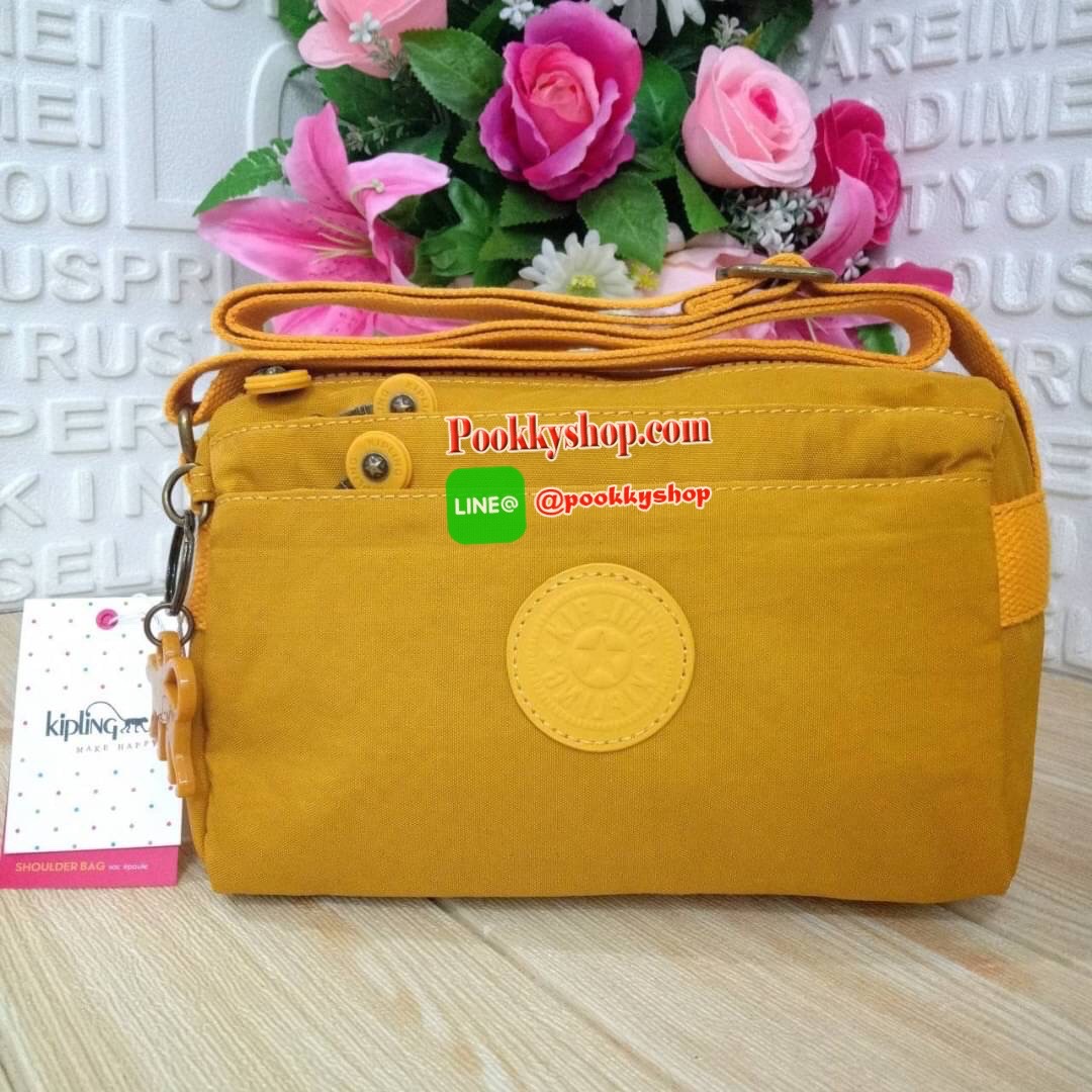 KIPLING Mini Crossbodybag กระเป๋าสะพายข้างขนาดกะทัดรัด ผลิตจากวัสดุ Nylon+ Polyester100% มีช่องใช้งานแยกย่อยมากถึง 4 ช่อง -ด้านหน้ามีช่องซิป 2 ช่อง -ช่องหลักโล่ง กว้าง จุของใช้ได้เยอะ -ด้านหลังมีช่องซิปอีก 1 ช่อง มาพร้อมพวงกุญเเจลิง สายสะพายยาวสามารถปรับไ