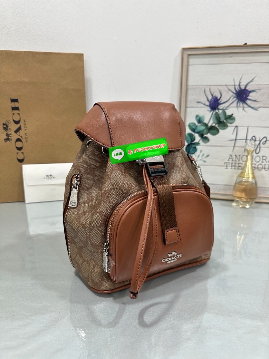 COACH PACE BACKPACK COACH CR100 | Refined calf leather | Inside zip and multifunction pockets | Drawstring and speedclip closures, fabric lining | Handle with 3" drop | Outside zip pocket | Outside zip access to interior |