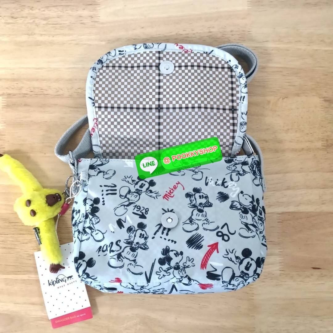 KIPLING SABIAN CROSSBODY MINI BAG กระเป๋าสะพายข้าง วัสดุ Nylon & Polyester 100% ขนาดเล็กกำลังน่ารัก เปิด-ปิดด้วยฝาปิดกระดุมแม่เหล็กและซิปแบรนด์ ด้านในทีแท็กแบรนด์