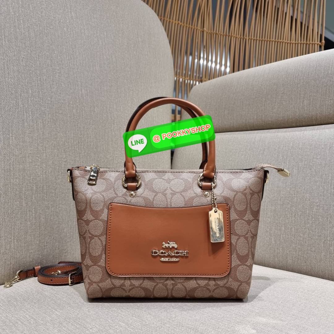 COACH F38089 MINI EMMA SATCHEL IN SIGNATURE CANVAS รุ่นหายาก รุ่นที่สาวๆตามหา จัดมาให้สมกับที่รอคอยกันไปเลยจ้า!! เป็นรุ่นที่ดีไซน์ออกมาให้ใช้งานง่าย สะดวก สวย หรู ดูดี!! กระเป๋าสะพายทรงสวย วัสดุหนังแคนวาสเคลือบลาย มาพร้อมสายสะพายข้างและหูจับในตัว ถอดออกถื