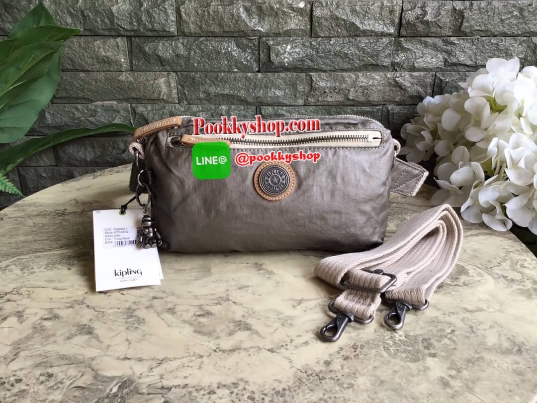 Kipling Yoku Medium Crossbody bag convertible to waistbag กระเป๋าคาดอกและสะพายข้าง คอลเลคชั่นใหม่ล่าสุดจาก Part of the Edgeland Plus วัสดุ100% polyester วัสดุกันน้ำ สีสันสไตล์วินเทจ ดูเป็นเอกลักษณ์ น้ำหนักเบา สะพายแล้วคล่องตัว ภายในกว้าง ใส่กระเป๋าเงินใบย