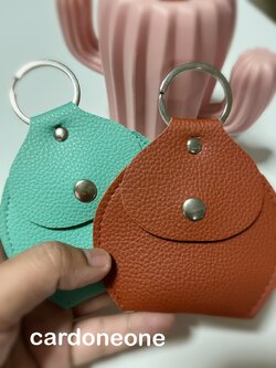 พวงกุณแจกระเป๋าหนังทรงลูกแพร