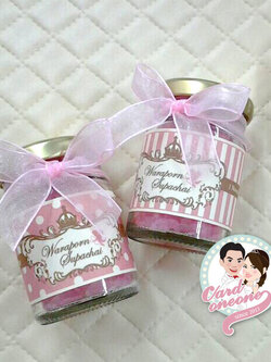 ของชำร่วยน้ำตาลกรวดใส่ขวดแก้วผูกโบว์ขนาด 2 ออนซ์