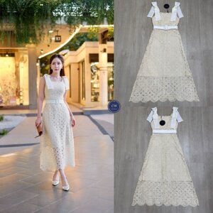 เดรสแฟชั่น เดรสยาวเนื้อผ้าลูกไม้ฉลุวงกลม ดีไซน์แขนกุดตรงบ่าแต่งโบว์ใหญ่สีครีมทั้งสองข้าง