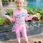 ฮ '' ( For Kids สำหรับเด็กอายุ 5-14 ปี ) Swimsuit for Girls ชุดว่ายน้ำ เด็กผู้หญิง L.O.L Surprise ชุดว่ายน้ำบอดี้สูท เสื้อแขนยาว กระโปรงกางเกงขายาว สีชมพู L.O.L ตุ๊กตาเซอร์ไพรส์ มาพร้อมหมวกว่ายน้ำและถุงผ้า สุดน่ารัก ใส่สบาย